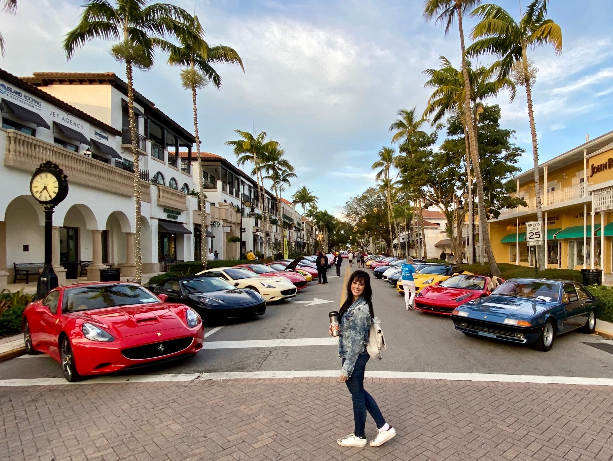 Krysta Sylvester at Cars on 5th in downtown Naples surrounded by Ferrari and exotic automobiles