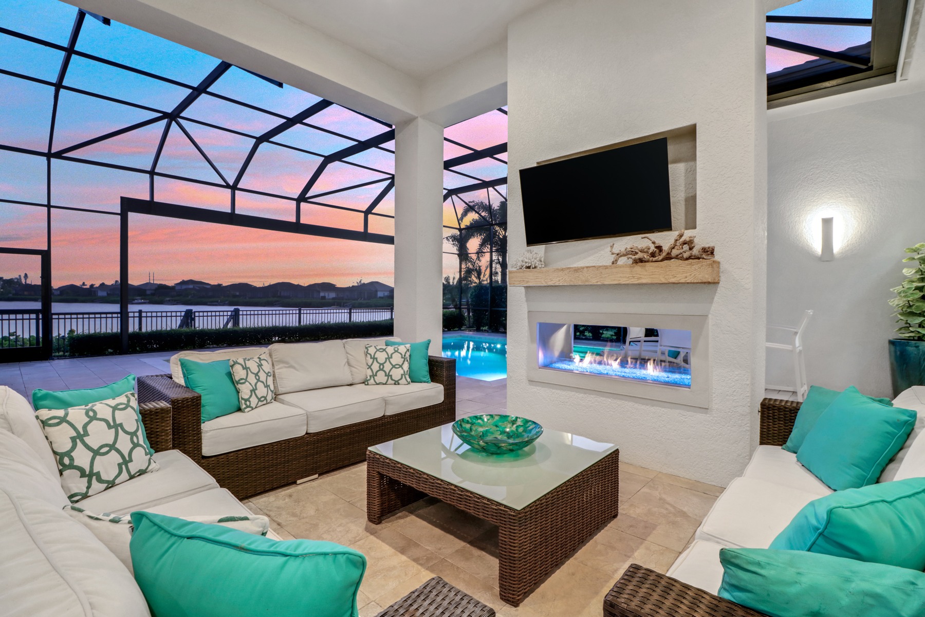 Luxury Southwest Florida lanai overlooking the water at sunset